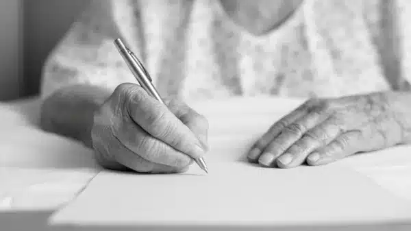 old-woman-writing-on-paper